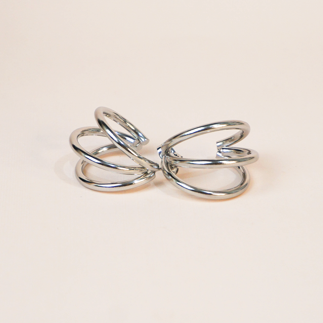 Aretes triples plateados