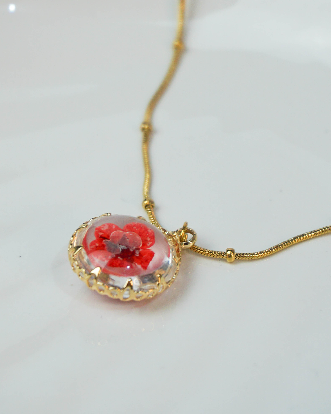 Collar flor encapsulada rosa