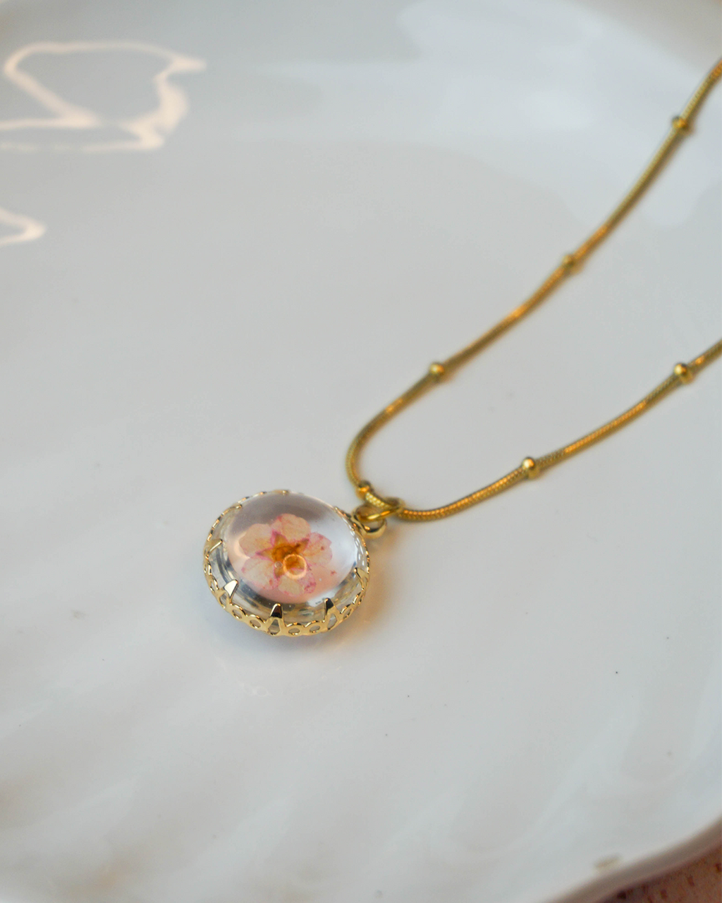 Collar flor encapsulada rosa