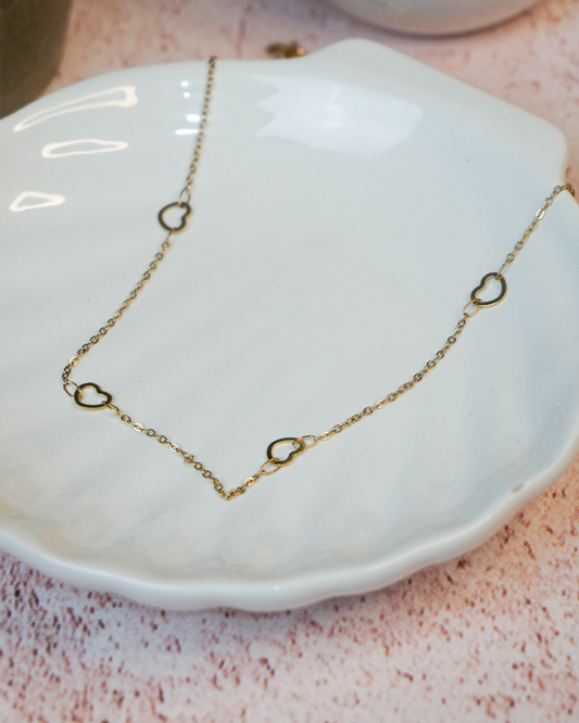 Collar corazones huecos