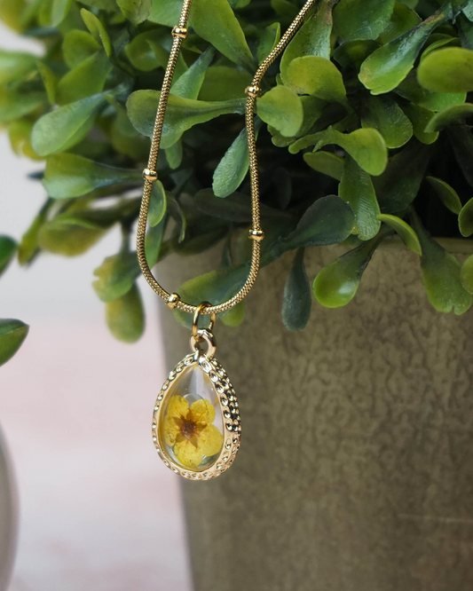 Collar flor encapsulada amarilla