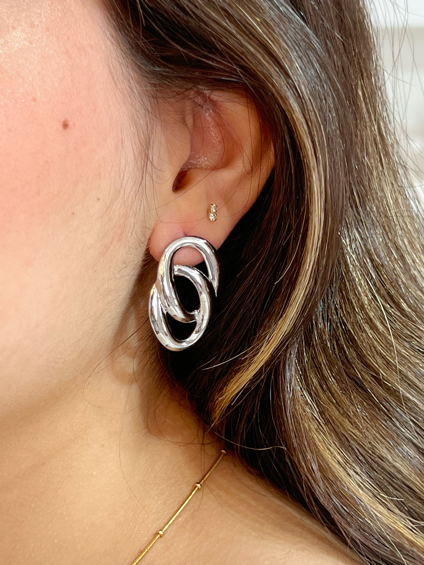 Aretes cadena plateada