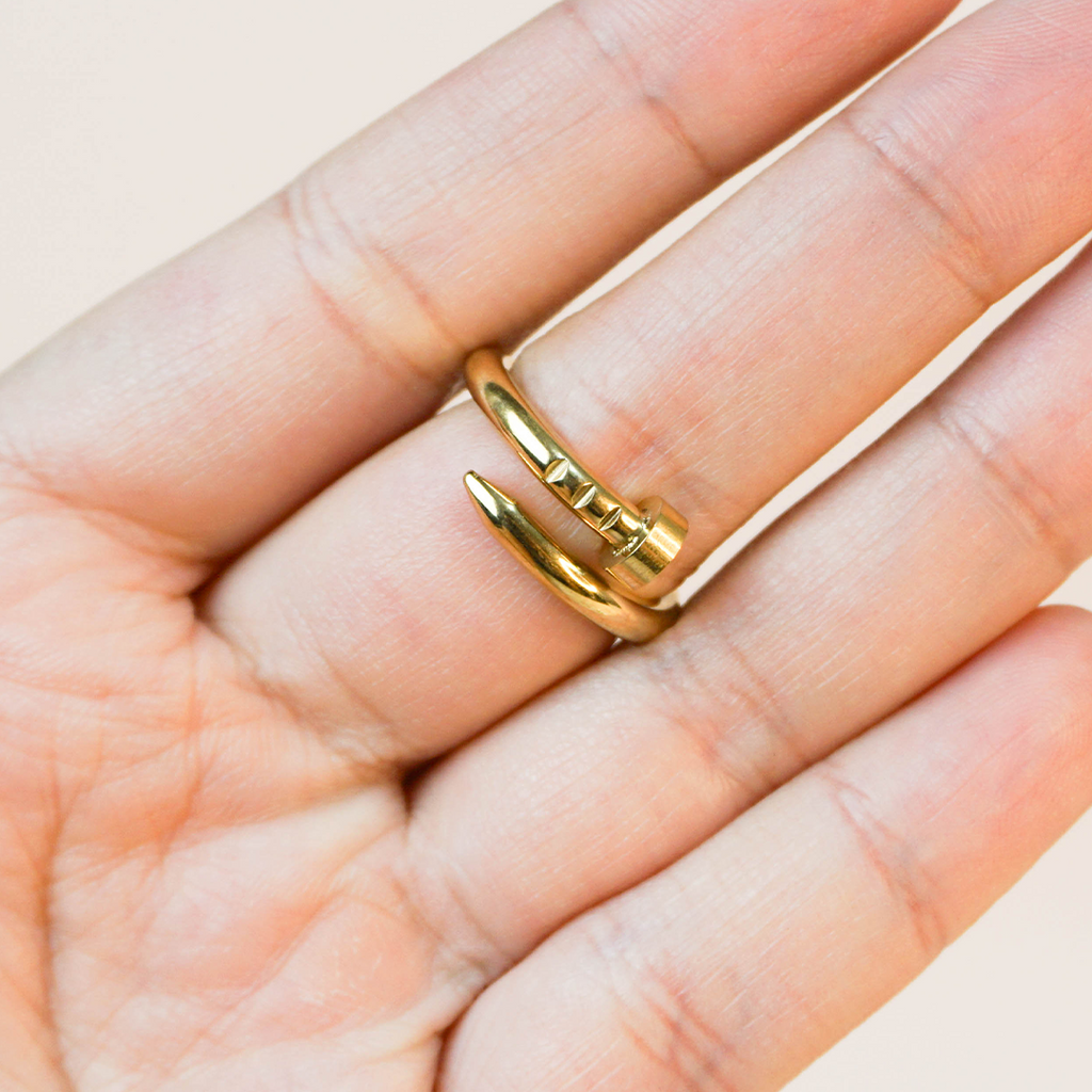 Anillo clavo dorado