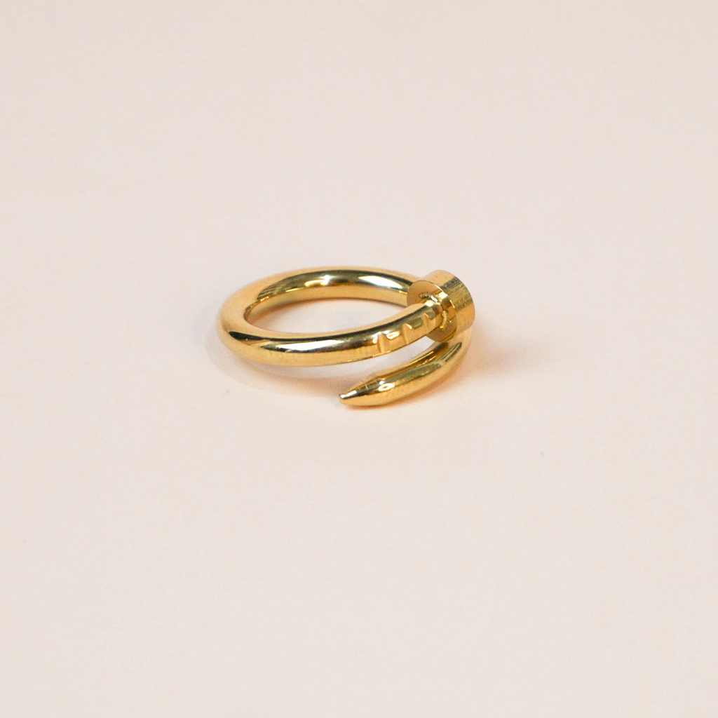 Anillo clavo dorado