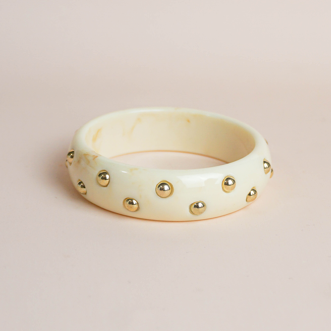 Brazalete aplicaciones doradas