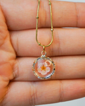 Collar flor encapsulada rosa