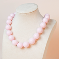 Collar bolas rosa pastel