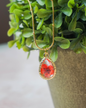 Collar Flor encapsulada rosa gota