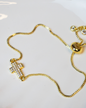 Pulsera ajustable cruz