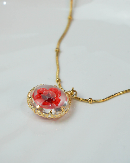 Collar flor encapsulada rosa
